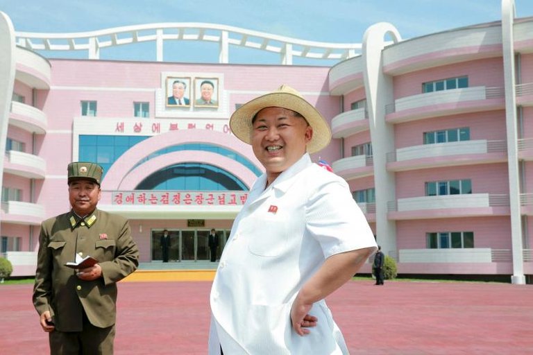 North Korean leader Kim Jong Un outside the Wonsan Baby Home and Orphanage in this undated photo released June 2, 2015. REUTERS.KCNA.jpg