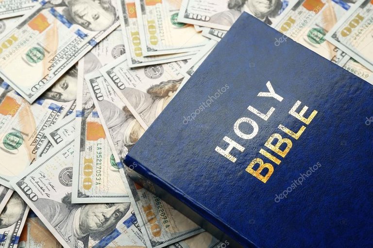 depositphotos_105081722-stock-photo-holy-bible-on-money-background.jpg