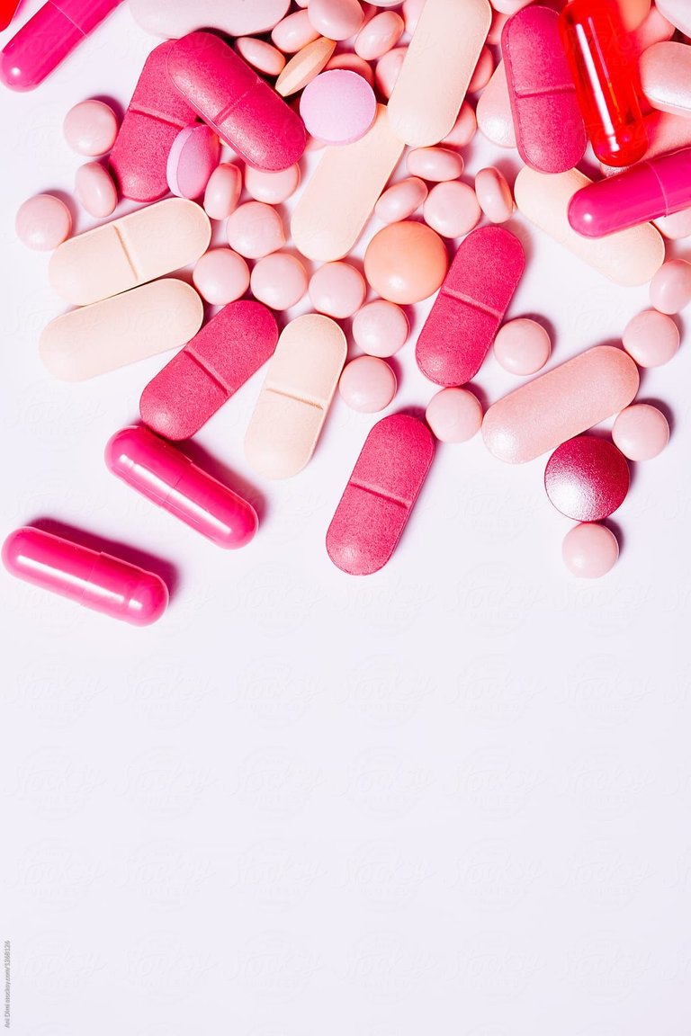 Pink pills by Ani Dimi for Stocksy United.jpg