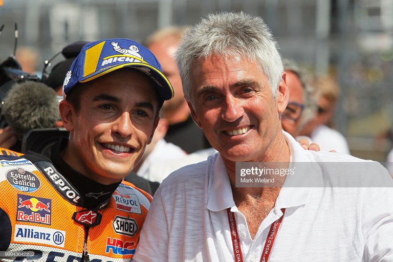 22-12-09-marc-marquez-of-spain-and-former-world-champion-mick-doohan-celebrate-picture-id999436422.jpg