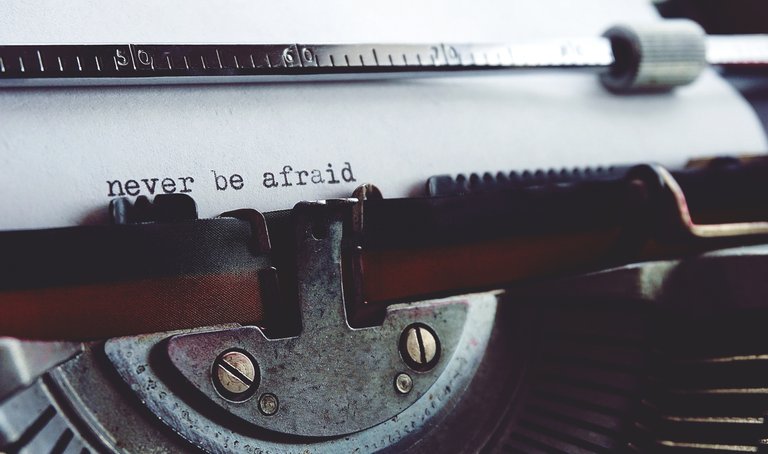 never-be-afraid-on-typewriter-2272193.jpg