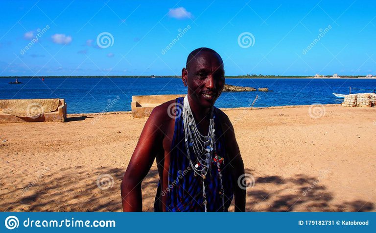 local-man-traditional-wear-lamu-island-kenya-wears-customary-blue-checked-shuka-beads-179182731.jpg