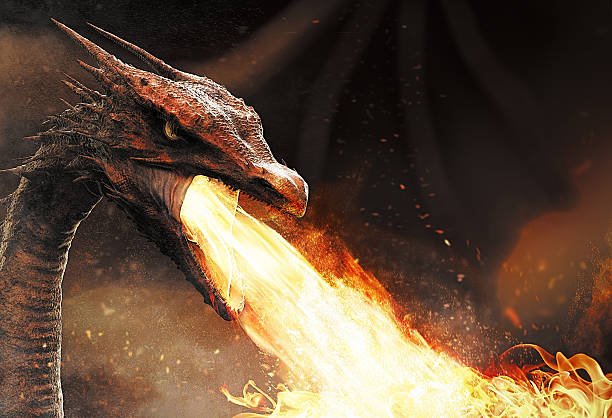 dragon-spitting-fire-picture-id506251458.jpg