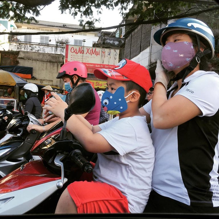 Mom and son on Moto.jpg