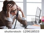 stock-photo-hard-working-woman-with-office-files-129618533.jpg