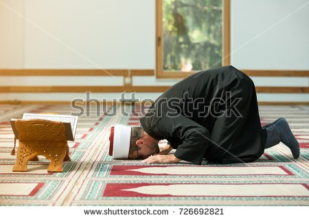 stock-photo-young-imam-praying-inside-of-beautiful-mosque-726692821.jpg