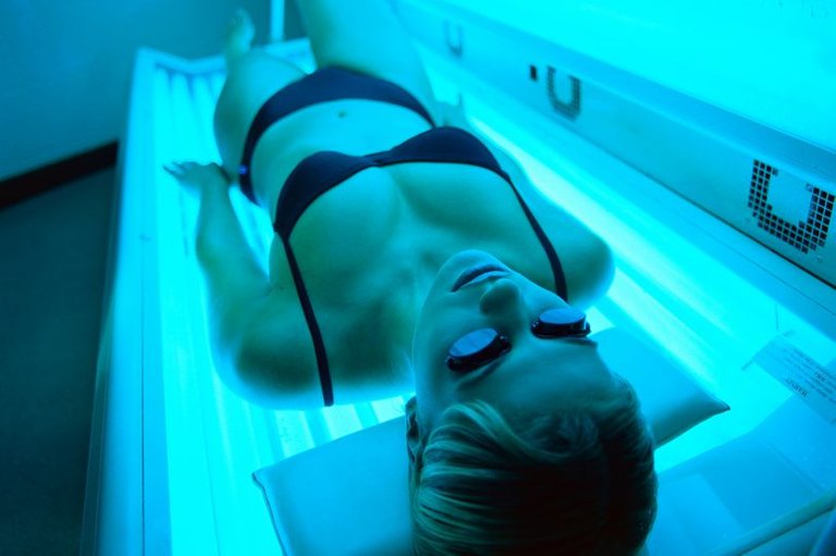 PROD-high-angle-view-of-a-woman-lying-in-a-tanning-machine.jpg