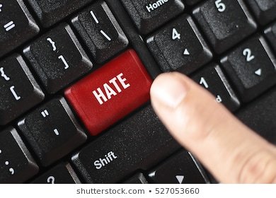 hate-word-on-red-keyboard-260nw-527053660.jpg