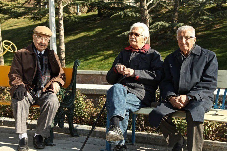 Inside-Iran-park-bench-men.jpg