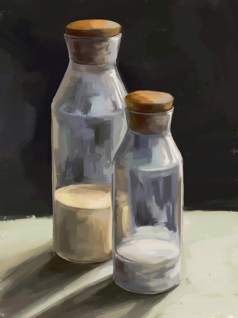 Two glass bottles on dark.jpg