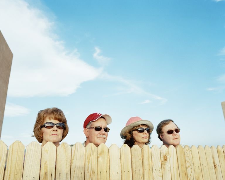 group-of-people-looking-over-fence-200365509-004-59ac7d2a845b34001155f5f5.jpg