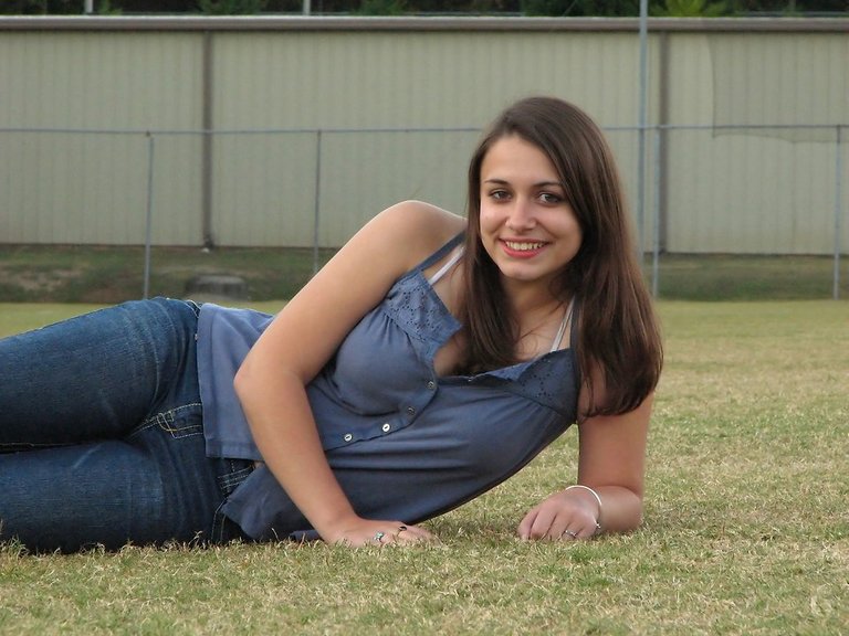 2710-outdoor-portrait-of-a-beautiful-teen-girl-posing-on-the-grass-pv.jpg