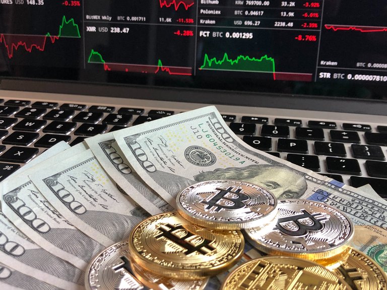 bitcoin-vs-dollar-bitcoins-and-cash-cryptocurrency-730573.jpg