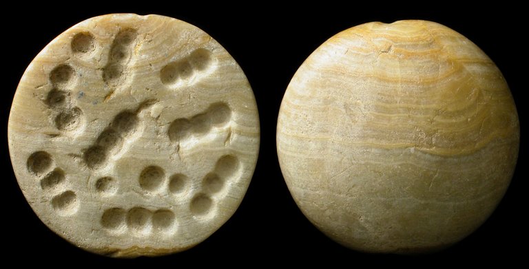 Ancient-stone-coin.jpg