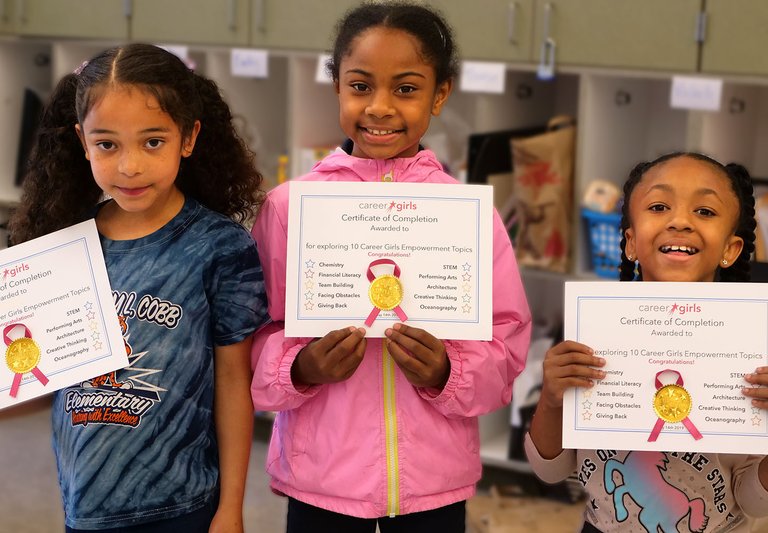 3-Girls-With-Certificates-1440x1000.jpg