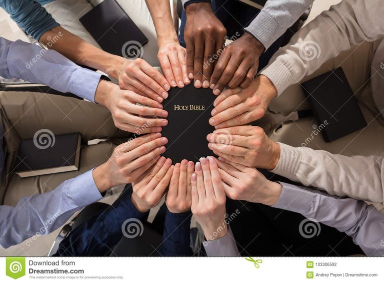 C__Data_Users_DefApps_AppData_INTERNETEXPLORER_Temp_Saved Images_overhead-view-hands-holding-holy-bible-103306592.jpg