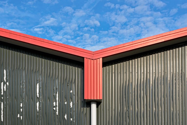 Large storage shed in red and green