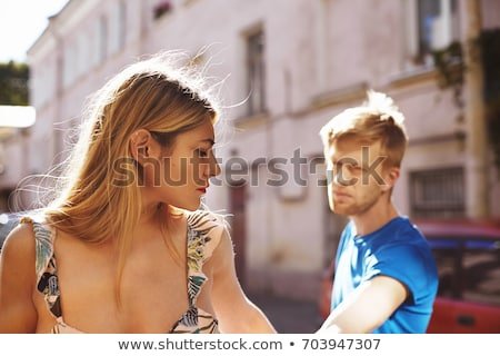 quarrel-between-young-lovers-strolling-450w-703947307.jpg