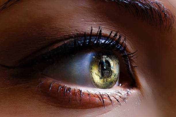 close-up-view-of-beautiful-female-eye-contact-lenses-bitcoin-eye-of-a-picture-id901315540.jpg