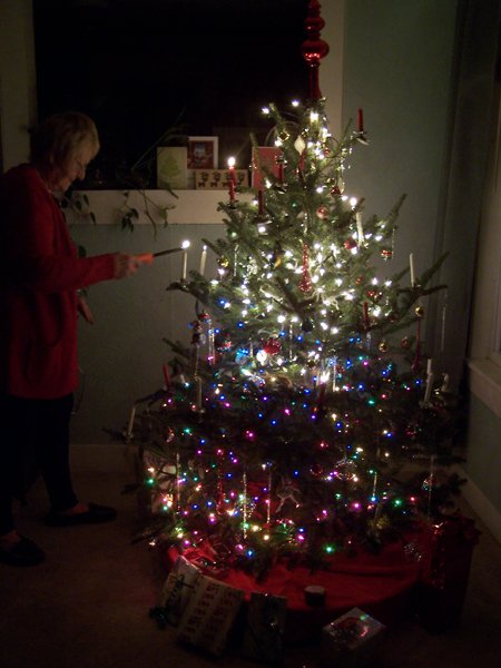 Christmas tree - Marianna lighting candles3 crop December 2019.jpg
