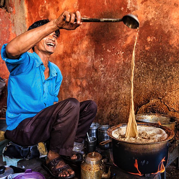 indian-street-seller-selling-tea-masala-chai-in-jaipur-picture-id499567966.jpg