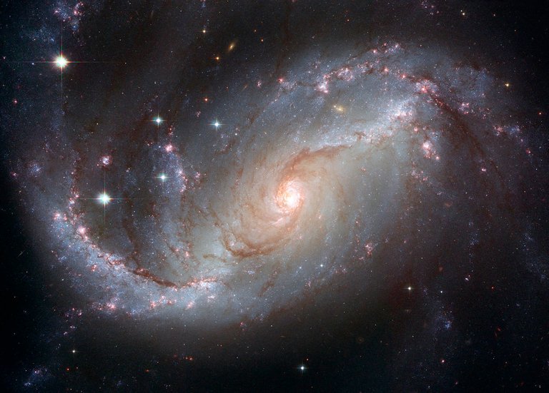 1200px-NGC_1672_HST.jpg