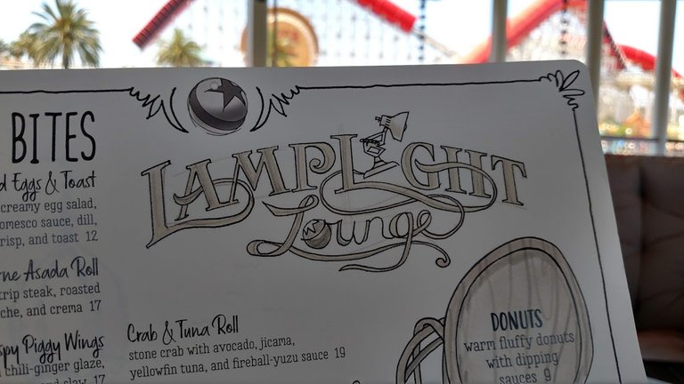 Title disney pixar lamplight lounge.jpg