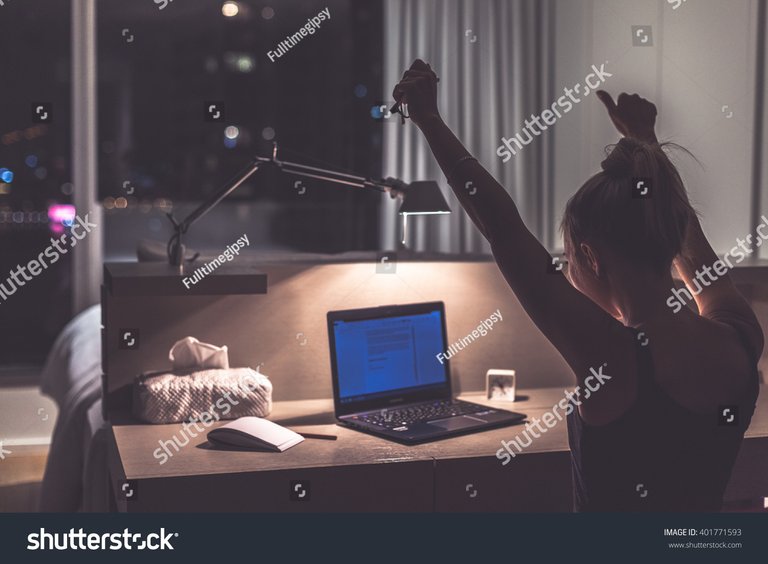 stock-photo-success-victory-or-meeting-deadline-concept-young-excited-caucasian-woman-or-teenager-is-holding-401771593.jpg