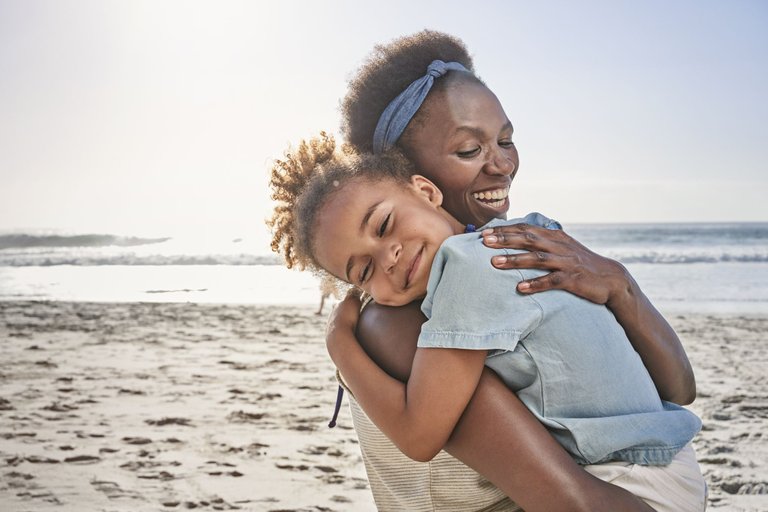 mother-and-daughter-on-beach-royalty-free-image-1606145719..jpg