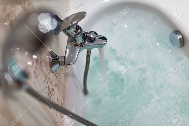 49271539-foamy-hot-bath-in-a-modern-bathroom-shallow-dof-color-toned-image-.jpg