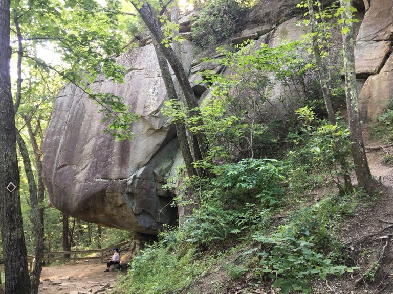 bench under big rock.jpg