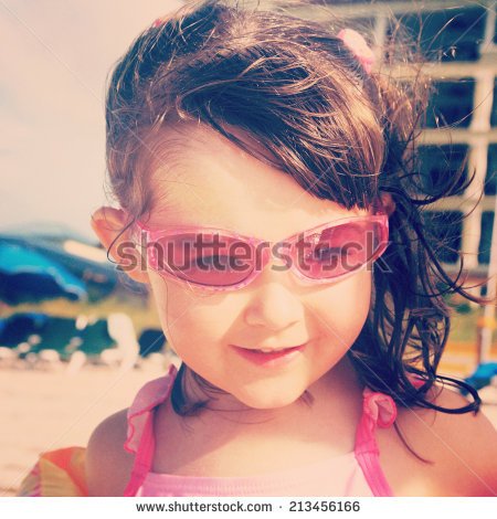 stock-photo-sweet-instagram-closeup-of-little-girl-at-the-beach-wearing-sunglasses-213456166.jpg