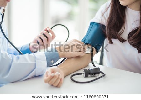 doctor-using-sphygmomanometer-stethoscope-checking-450w-1180800871.jpg