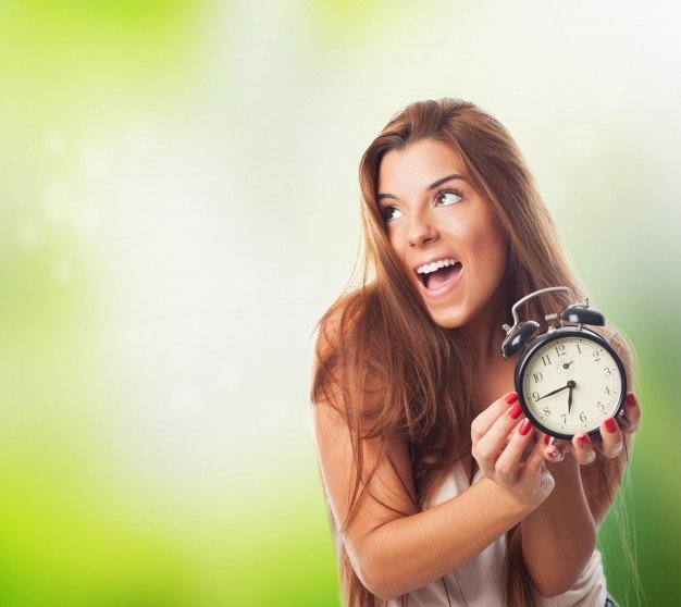 happy-girl-with-alarm-clock-hands_1187-5241.jpg