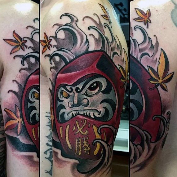 japanese-male-daruma-doll-tattoo-on-arm.jpg