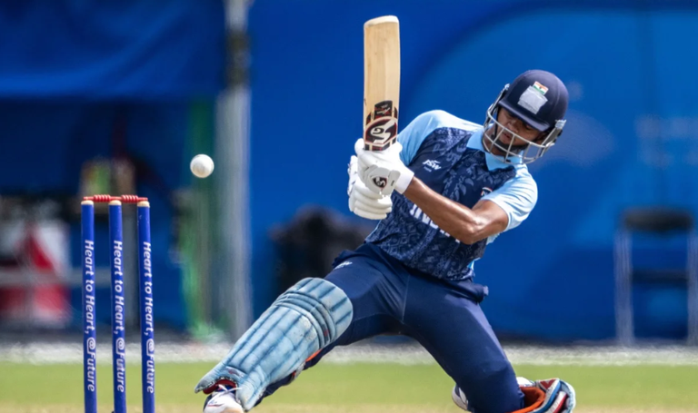 India beat  Nepal by 23 runs to reach into the semi-final.