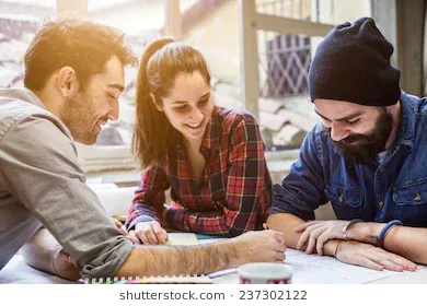 teamwork-three-young-architects-working-260nw-237302122.jpg