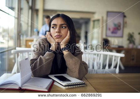 stock-photo-young-student-girl-dressed-in-casual-wear-worried-about-coursework-project-thinking-about-662869291.jpg