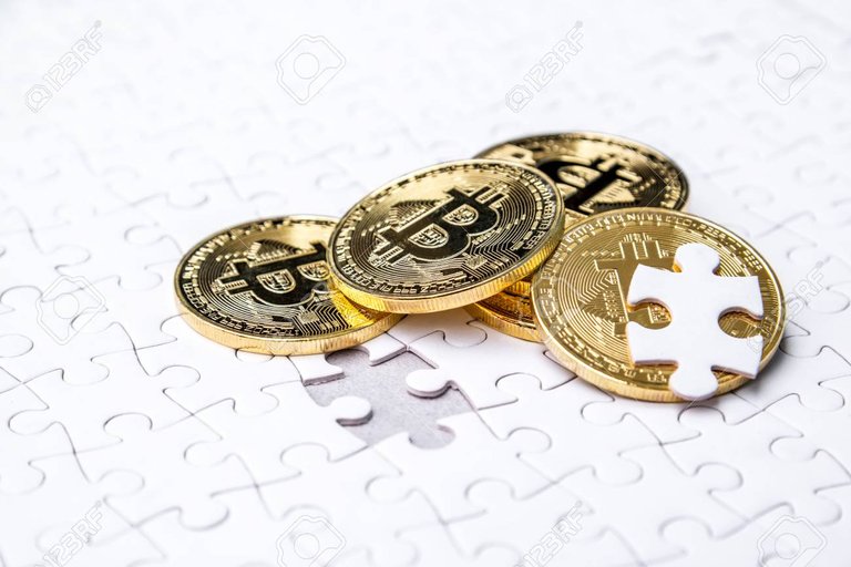 98850049-gold-bitcoin-on-white-jigsaw-or-puzzle-cryptocurrency-missing-jigsaw-puzzle-pieces-business-solution.jpg