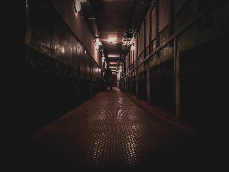 man-standing-in-missile-base-corridor.jpg