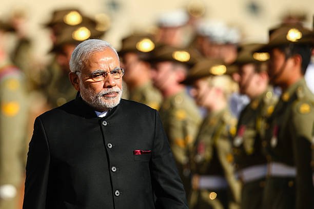 indian-prime-minister-narendra-modi-inspects-the-gaurd-at-parliament-picture-id459135142.jpg