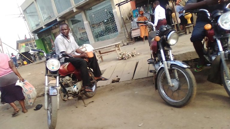 Okada Man Having A Local Brew.jpg