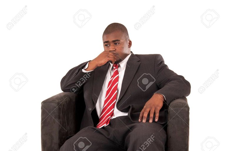 22836184-male-model-sitting-in-suit-deep-thinking.jpg