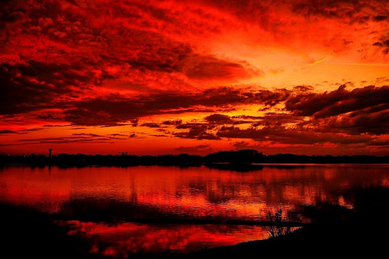 sunsets-water-red-colorful-sky-reflection-beautiful-sea-ocean-clouds-sunset-fire-nature-colors-river-animated-wallpaper.jpg