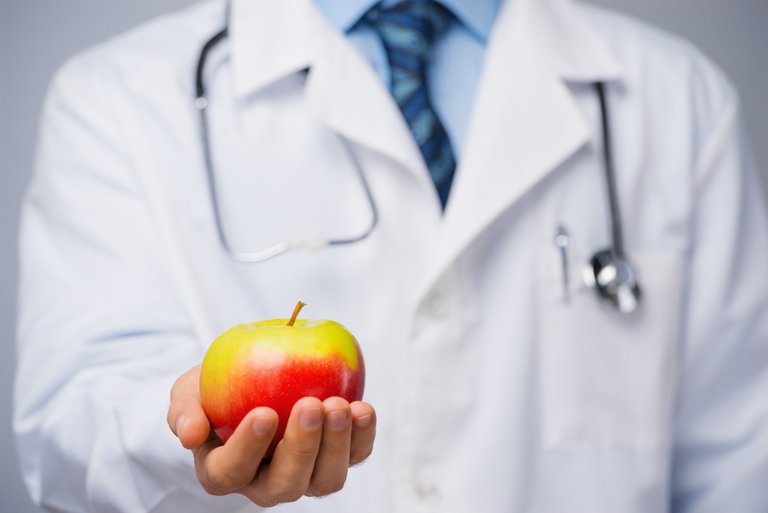 bigstock-Doctor-with-an-apple-74771989.jpg