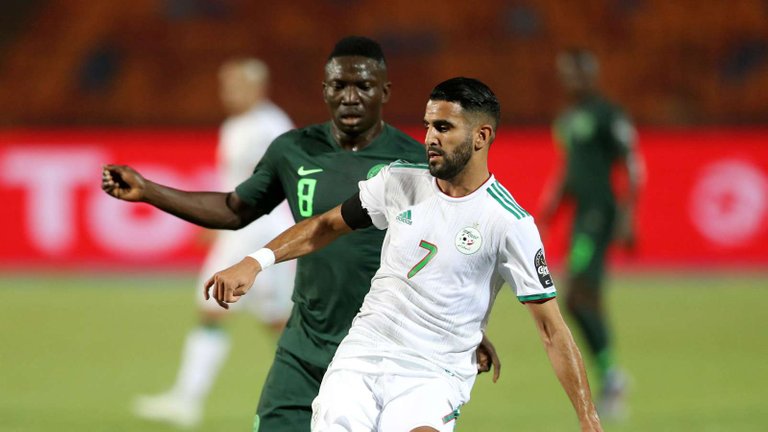 nigerias-oghenekaro-etebo-and-algerias-riyad-mahrez-afcon-2019_ypqe9tr0hdez1l7vk3sgt5uzt.jpg