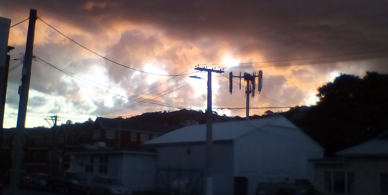 SunsetThroughImpendingThunderstormOverWellington20November2019.png