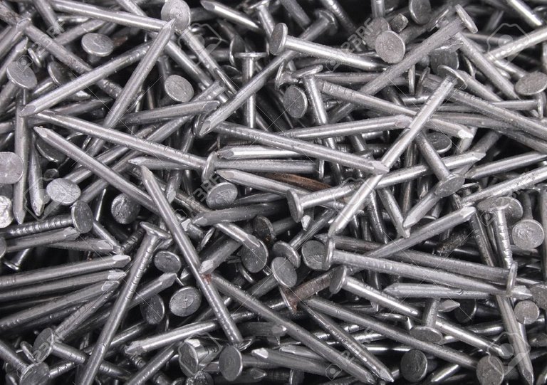 3127986-technological-metal-background-from-the-steel-nails.jpg