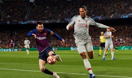 lionel-messi-kiri-dan-virgil-van-dijk-bersaing-dalam-_191204064000-969.jpg