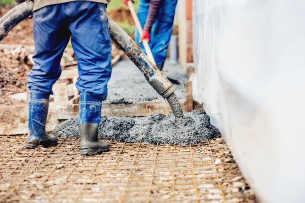 constuction-details-worker-laying-cement-or-PUEFNWK (1).jpg